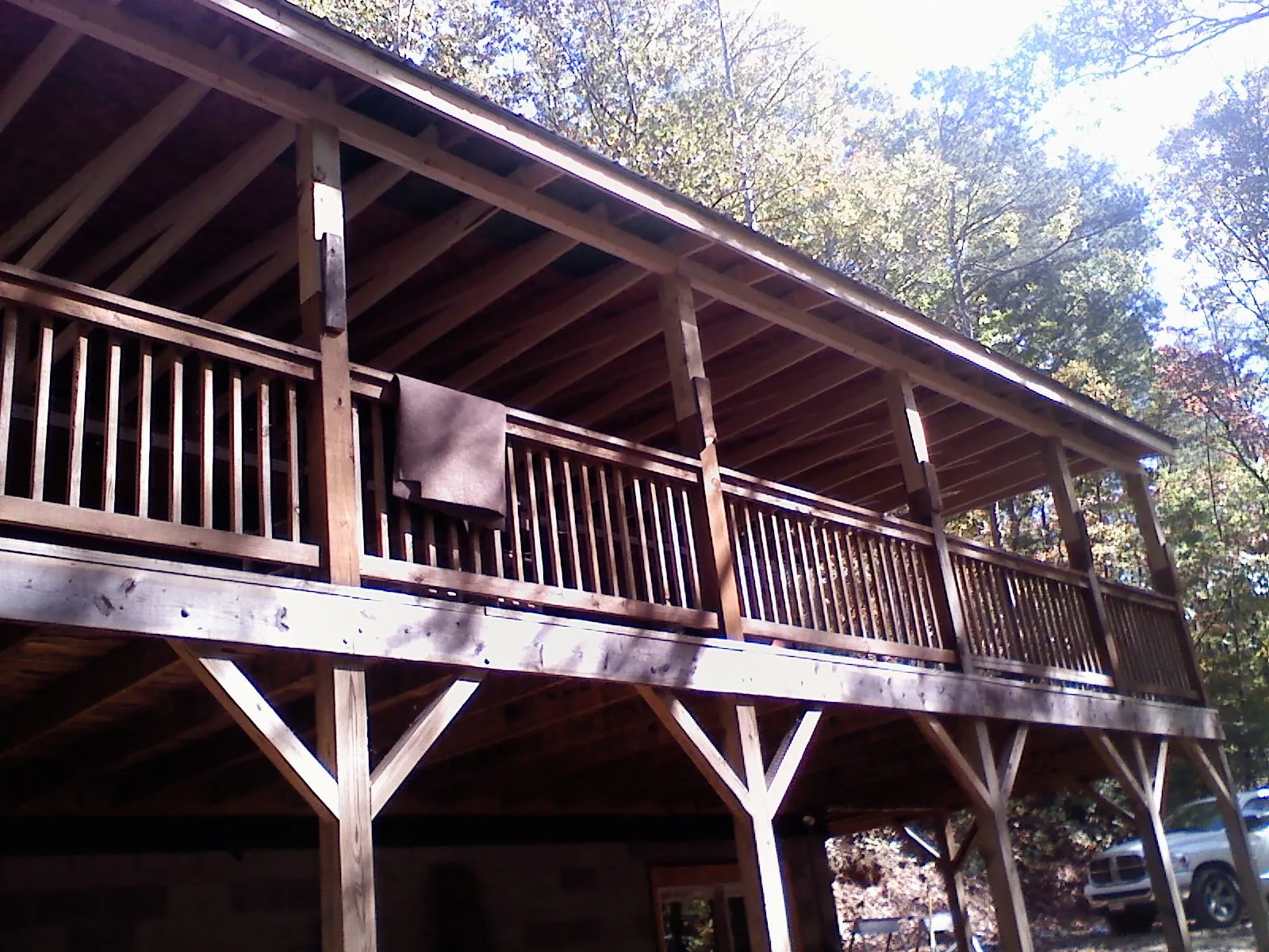 Timber framing under a new elevated porch and deck — Roof Leak Repair in Mount Sherman by Roofing Brothers